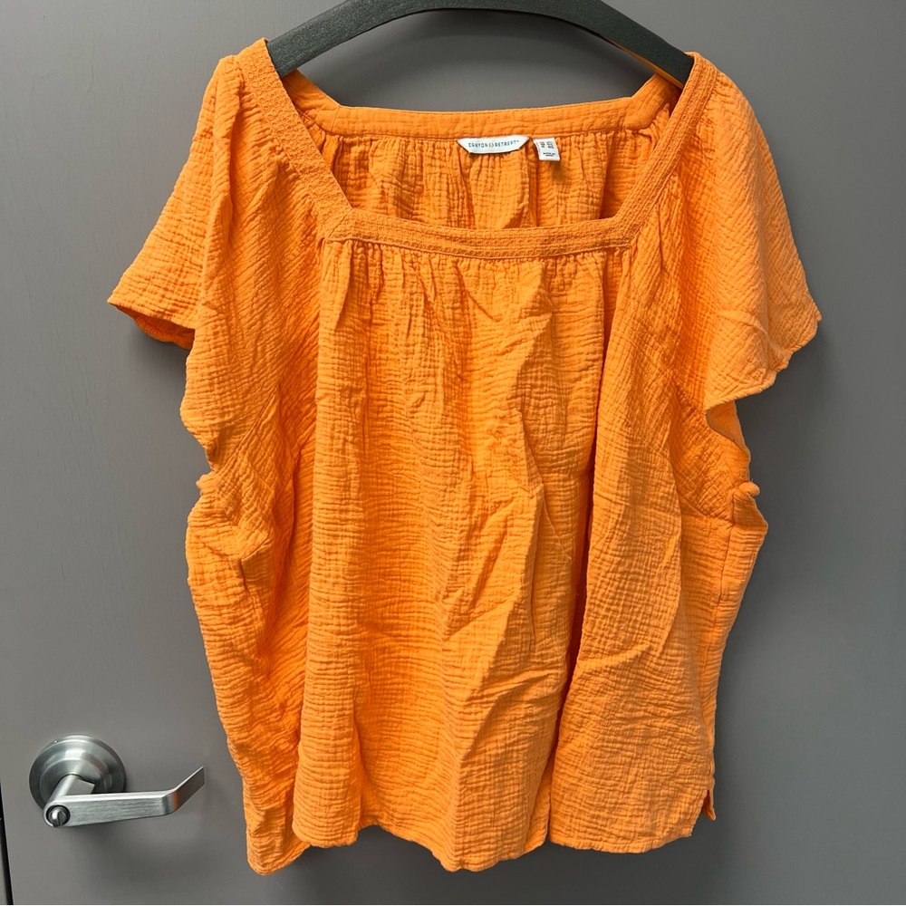 Orange Flutter Sleeve Smocked Blouse